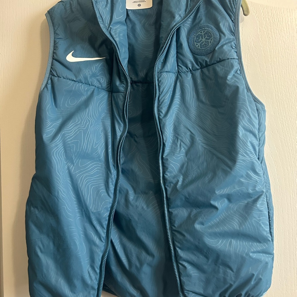 Nike Light Blue Puffer Vest with Subtle Wave Print